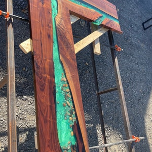 L shaped bartop river table with stone rocks trout walnut live edge