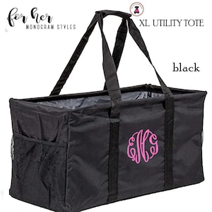 May include: Black XL utility tote bag with a pink monogram "EHG" and the text "XL Utility Tote" and "black".