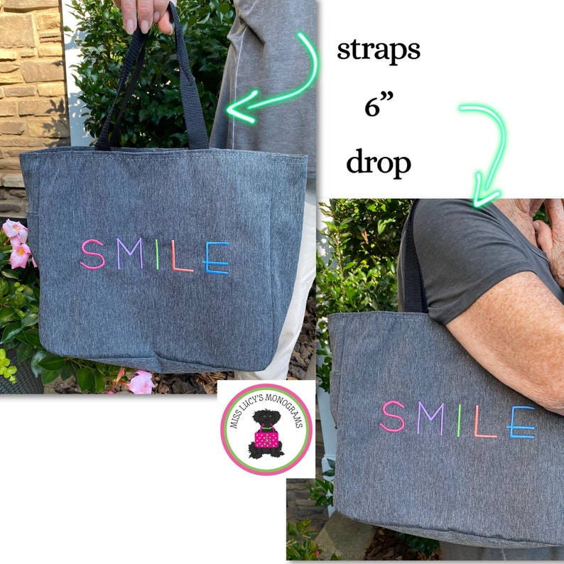 May include: Gray tote bag with black straps and a 6 inch drop. The bag has the word "SMILE" embroidered on the front in rainbow colors. The bag is made by Miss Lucy's Monograms.