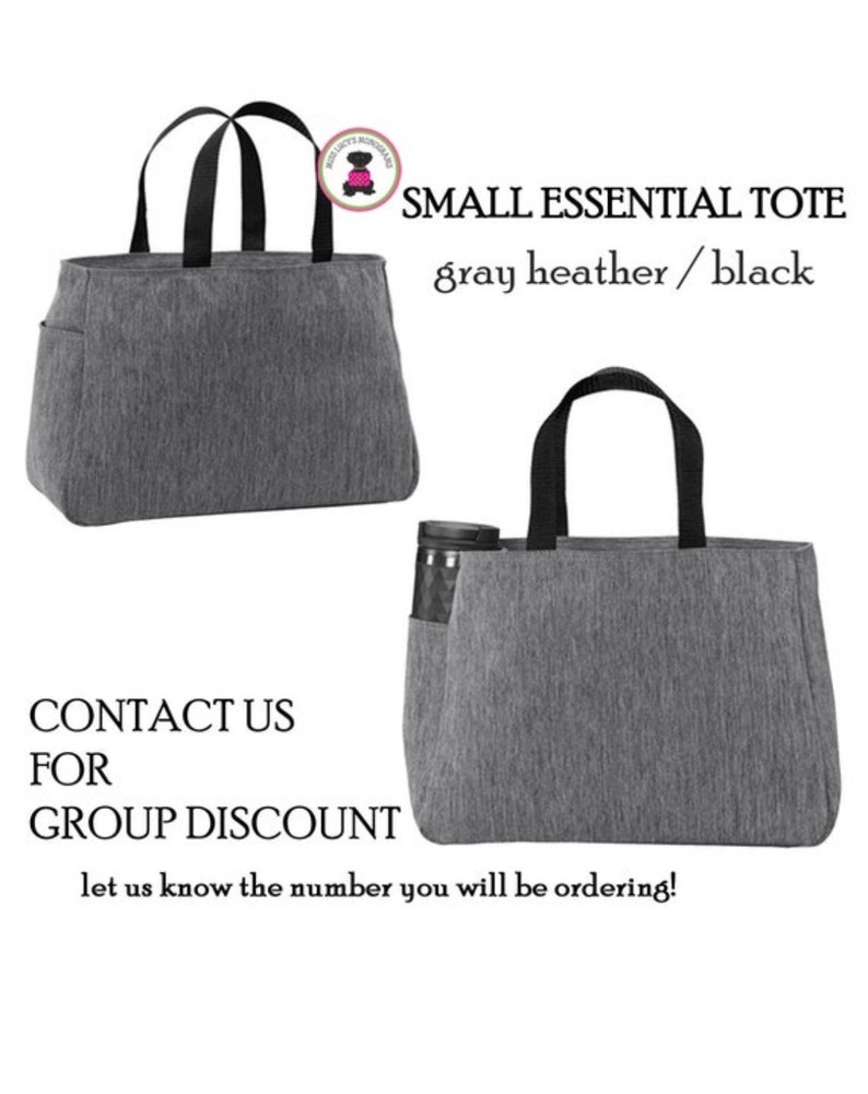 May include: Gray heather tote bag with black handles. The tote bag has a small pocket on the side. The text "SMALL ESSENTIAL TOTE gray heather/black" is displayed above the image.
