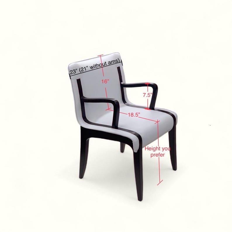 May include: A white upholstered chair with black trim and wooden legs. The chair has a 23 inch back height, 16 inch seat width, 7.5 inch arm length, and 18.5 inch seat depth.