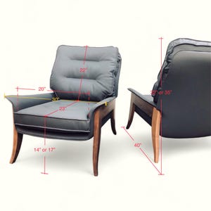 May include: Two gray upholstered armchairs with wooden legs. The chair on the left is 20 inches wide, 30 inches deep, and 22 inches tall. The chair on the right is 40 inches tall.