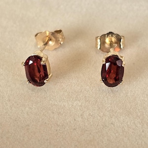 14K Yellow Gold Oval Faceted Garnet Stud Earrings  .41CT