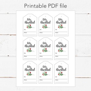 May include: Nine printable gift tags with a white background and black text that reads "Feliz Navidad". Each tag features a green sprig with red berries.