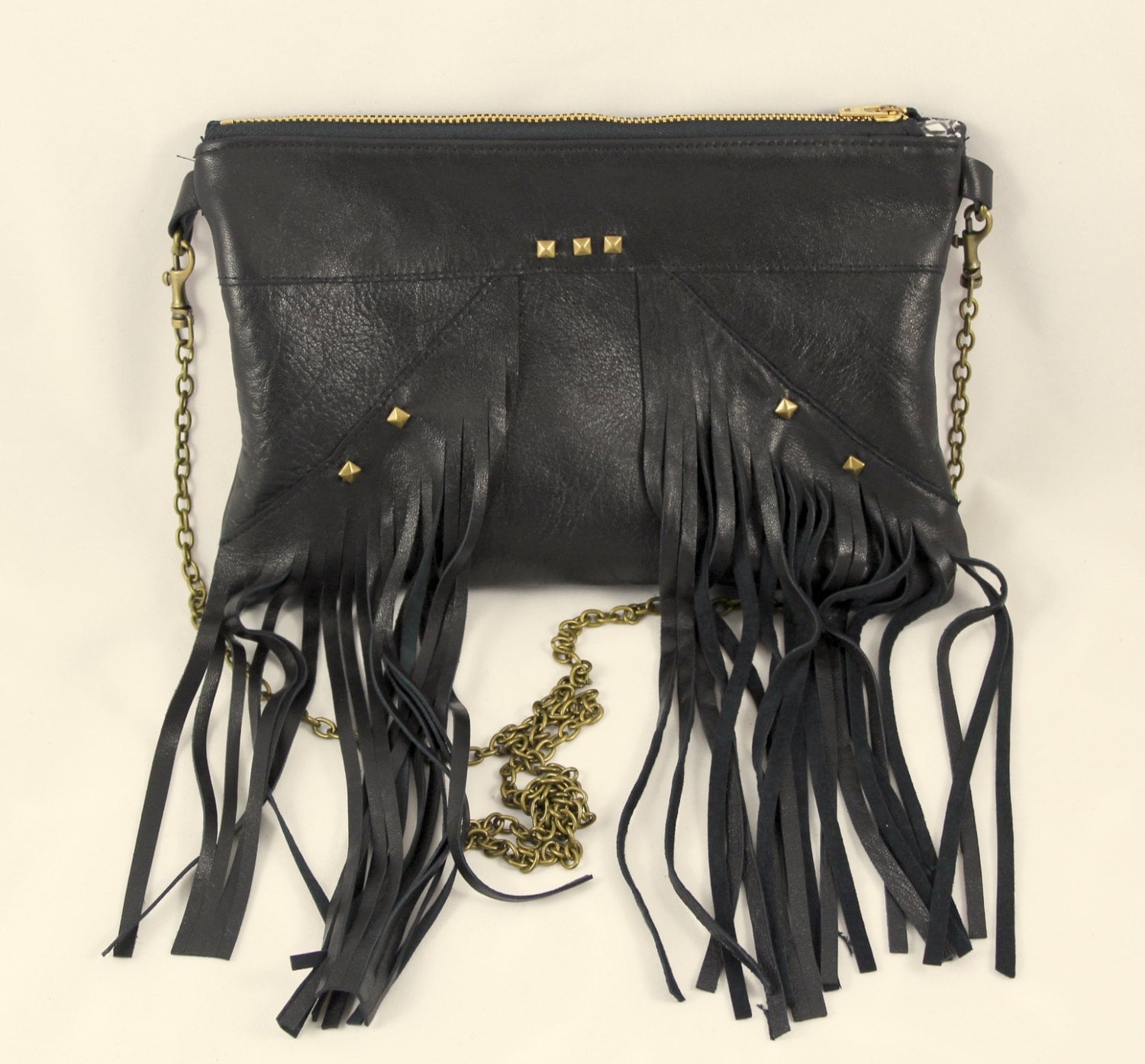 black fringe clutch bag