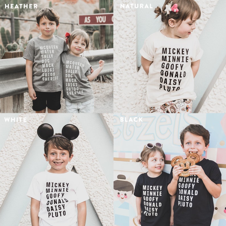 May include: Four children's t-shirts in different colours: heather grey, natural, white, and black. The shirts feature a variety of Disney characters, including Mickey Mouse, Minnie Mouse, Goofy, Donald Duck, Daisy Duck, and Pluto. The text on the shirts reads "Mickey Minnie Goofy Donald Daisy Pluto".