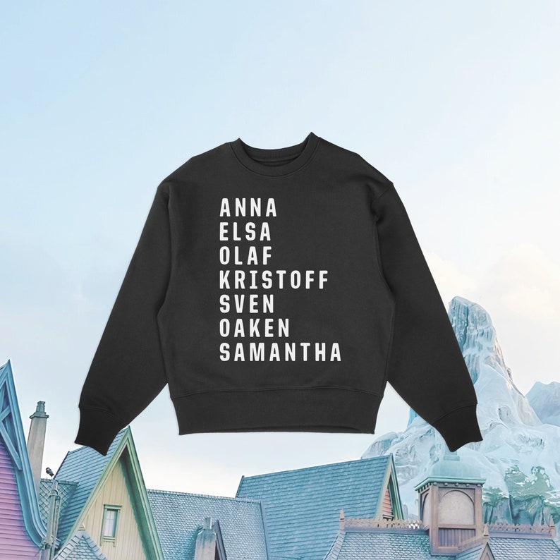 May include: Black sweatshirt with white text listing the names Anna, Elsa, Olaf, Kristoff, Sven, Oaken, and Samantha.