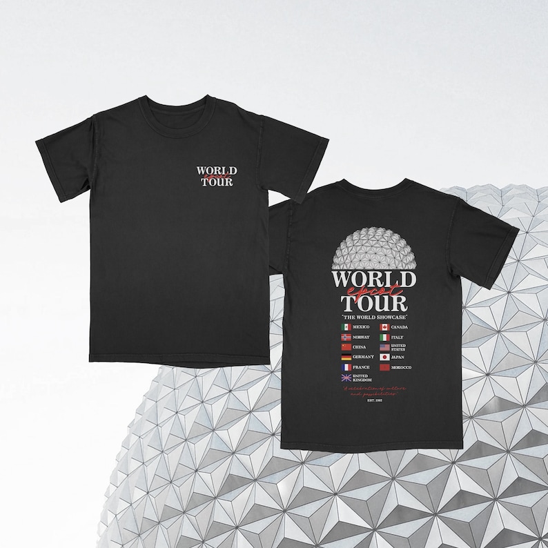 May include: Black t-shirt with the text "WORLD epcot TOUR" and a graphic of the Epcot World Showcase. The graphic includes flags from various countries.