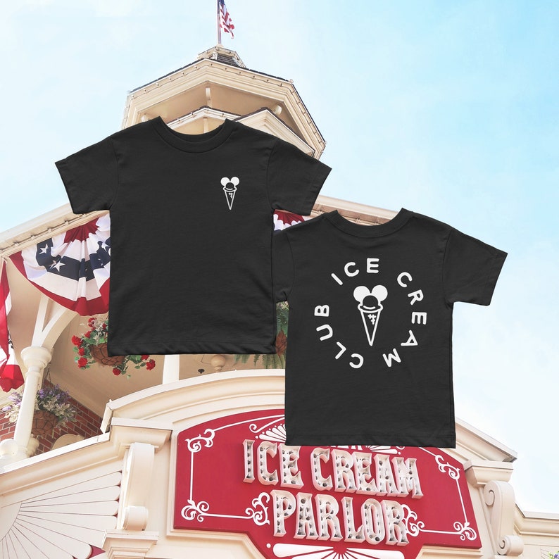 May include: Two black t-shirts featuring a white ice cream cone design. One shirt displays the text "Ice Cream Club" in a circle around the ice cream cone. The other shirt has a smaller ice cream cone design on the left chest.