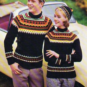 May include: Two people wearing colorful knitted sweaters and hats, standing in front of a white car. The sweaters have a traditional Norwegian design. The text "SC3 9p" and "P&B Wools" is visible in the top right corner of the image. The text "Norwegian Sportswear by P&B" is visible at the bottom of the image.