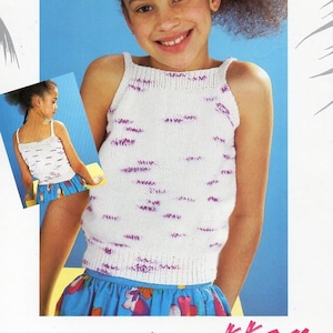 May include: A white tank top with a purple stripe pattern. The tank top is being modeled by a young person with dark hair. The image has the text "Beach Club Collection DK 24-34" and "Trendsetter" on it.