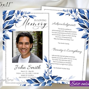 May include: A blue and silver memorial card with a photo of a man. The card has a floral design and the text "In Loving Memory" and "John Smith". The text also includes the date and time of the memorial service.