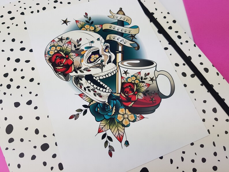 May include: A colorful illustration of a skull with a coffee cup and a dagger. The skull has a sugar skull design with flowers and the text "Death Before Decaf".