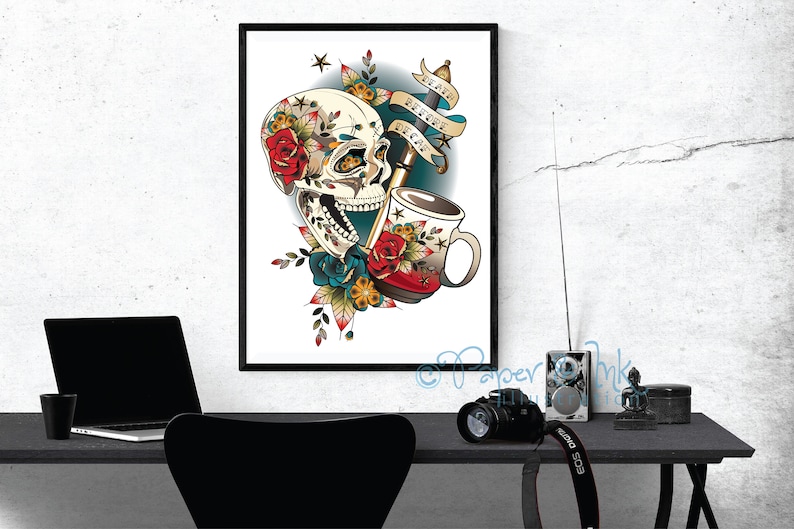 May include: A vintage-style illustration of a skull with flowers and a coffee cup. The skull has a toothy grin and is surrounded by red, blue, and yellow flowers. The coffee cup is white with a red and blue design. The text "Death Before Decaf" is written on a banner above the skull.