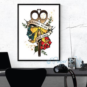 May include: A white background with a gold and red tattoo-style illustration of a pair of scissors, a measuring tape, and a rose. The text "Measure Twice Cut Once" is written on a banner.