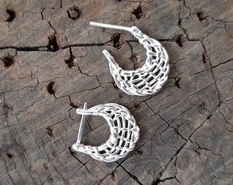 Sterling silver woven earrings, snap hook closure.