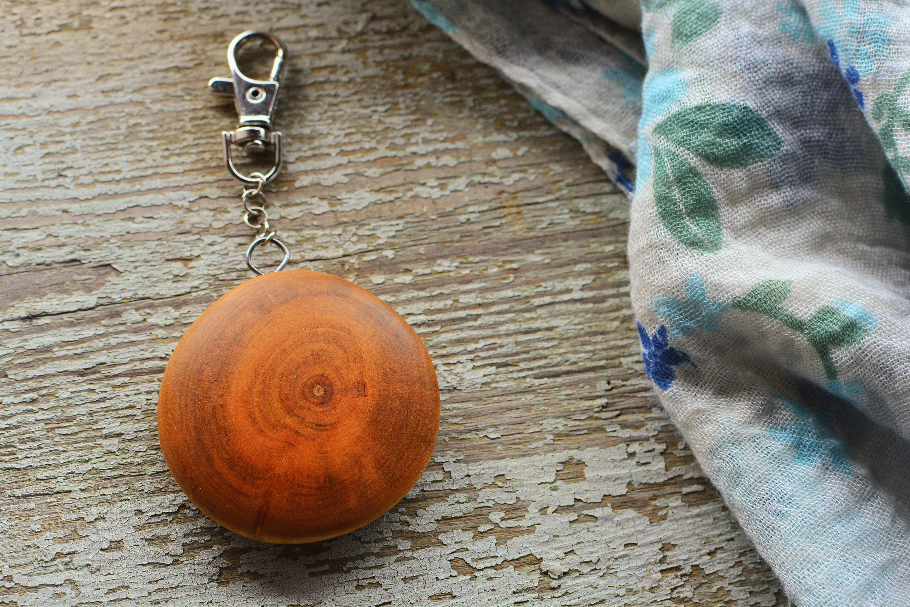 Hardwood charm keychain.