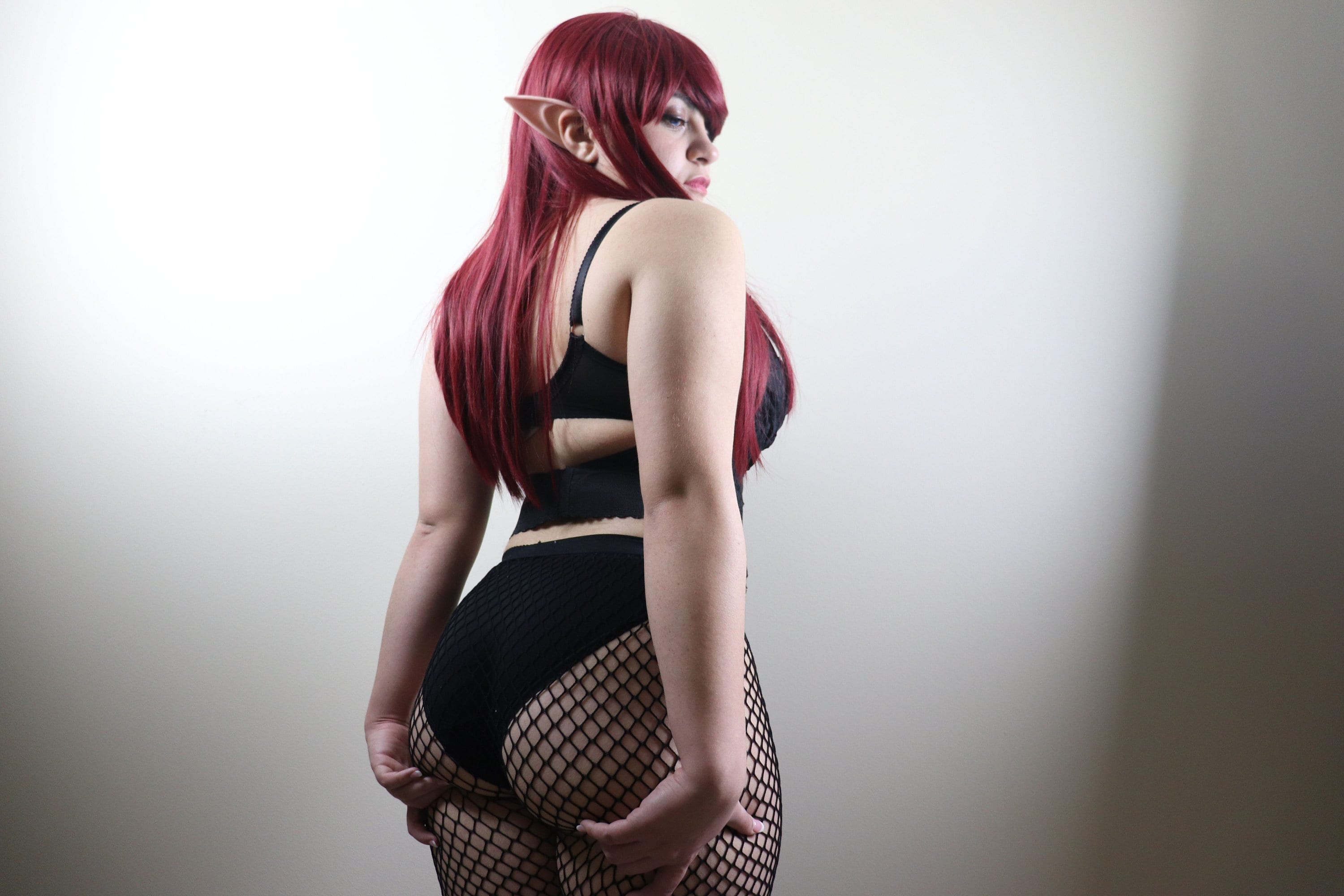 Goth Butt In Fishnet.