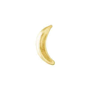 May include: A gold crescent moon charm. This charm is a simple and elegant design that would be perfect for a necklace or bracelet.