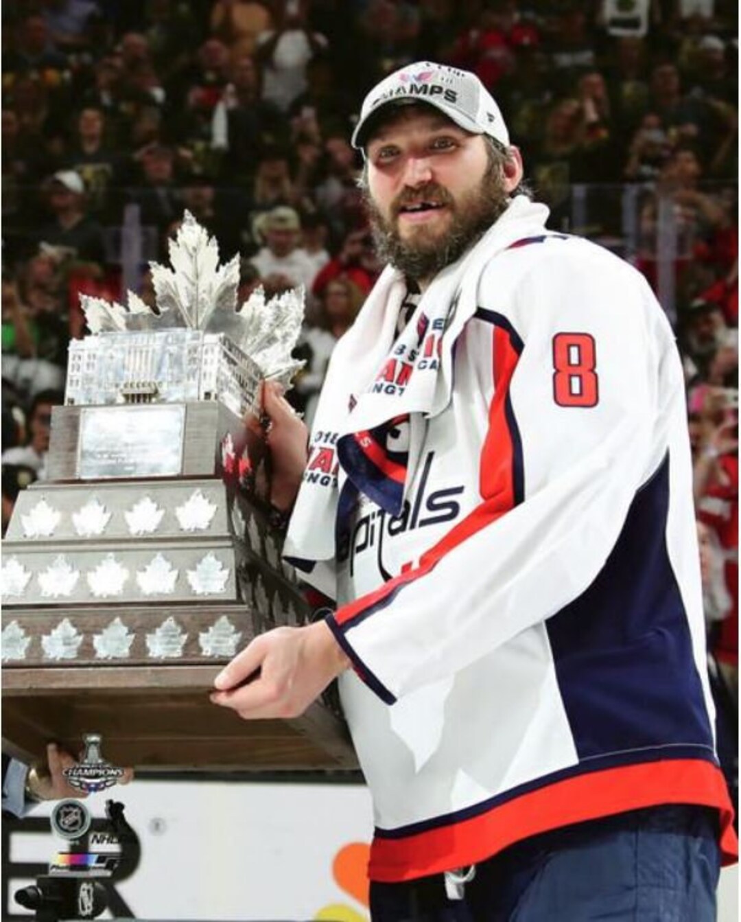 Alex Ovechkin receives mini trophies for winning Stanley Cup and being  named playoff MVP