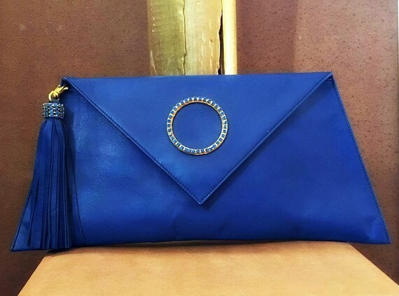 Electric blue clutch bag hotsell