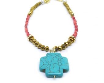 Turquoise cross, Red coral necklace.