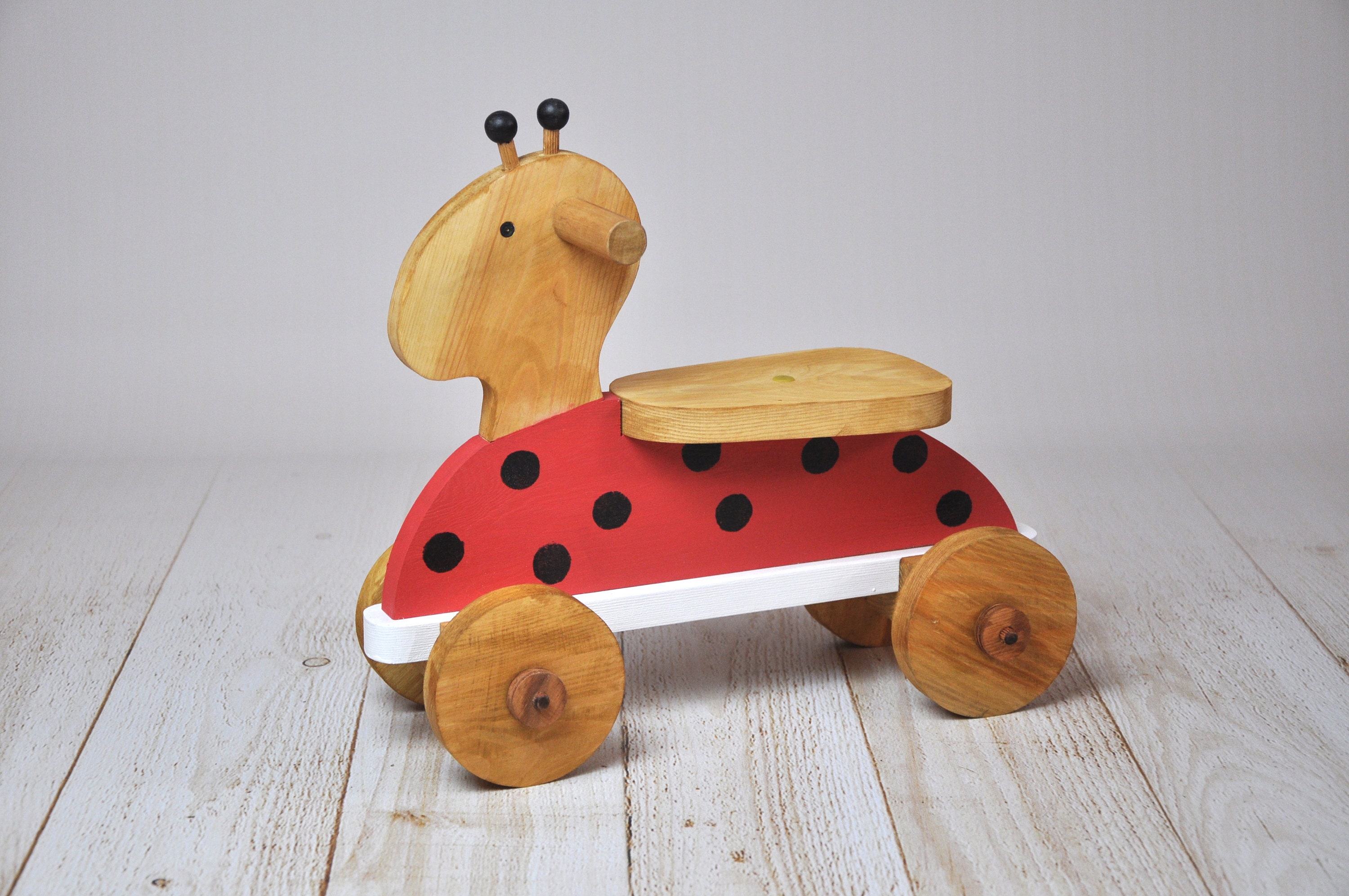 wooden ladybug ride on
