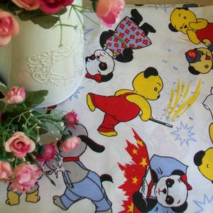 Sooty, Sweep & Soo toys Vintage knitted toys Sooty and Sweep and Soo bunting all having fun Sooty and Sweep unused 1970s vintage fabric xx white 1970's fabric
