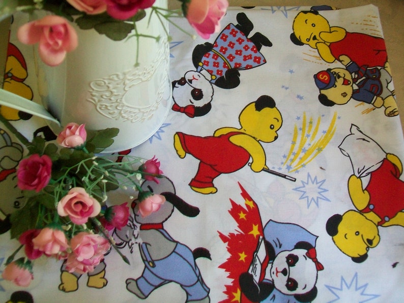 Sooty, Sweep & Soo toys Vintage knitted toys Sooty and Sweep and Soo bunting all having fun Sooty and Sweep unused 1970s vintage fabric xx white 1970's fabric