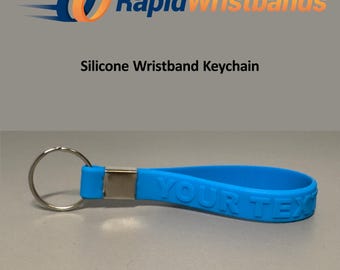 Kundenspezifische Silikon-Armband-Schlüsselanhänger Geprägte Art