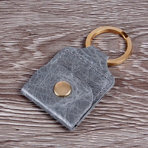 Zakje sleutelhanger gitaar pick houder, pond munt houder, SD-kaart houder, Trolley token houder, zakje sleutelhanger, ADT alarm fob houder, vintage verbergen
