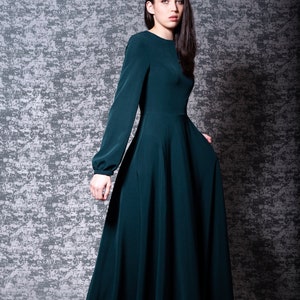 Dark blue green dress store