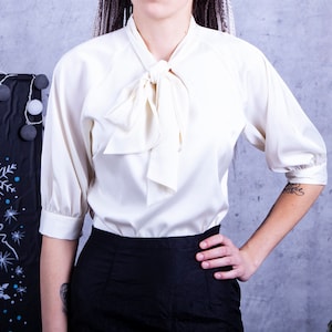 Stylish silk blouse with bow. Silk top with flared sleeves - 25+ colors