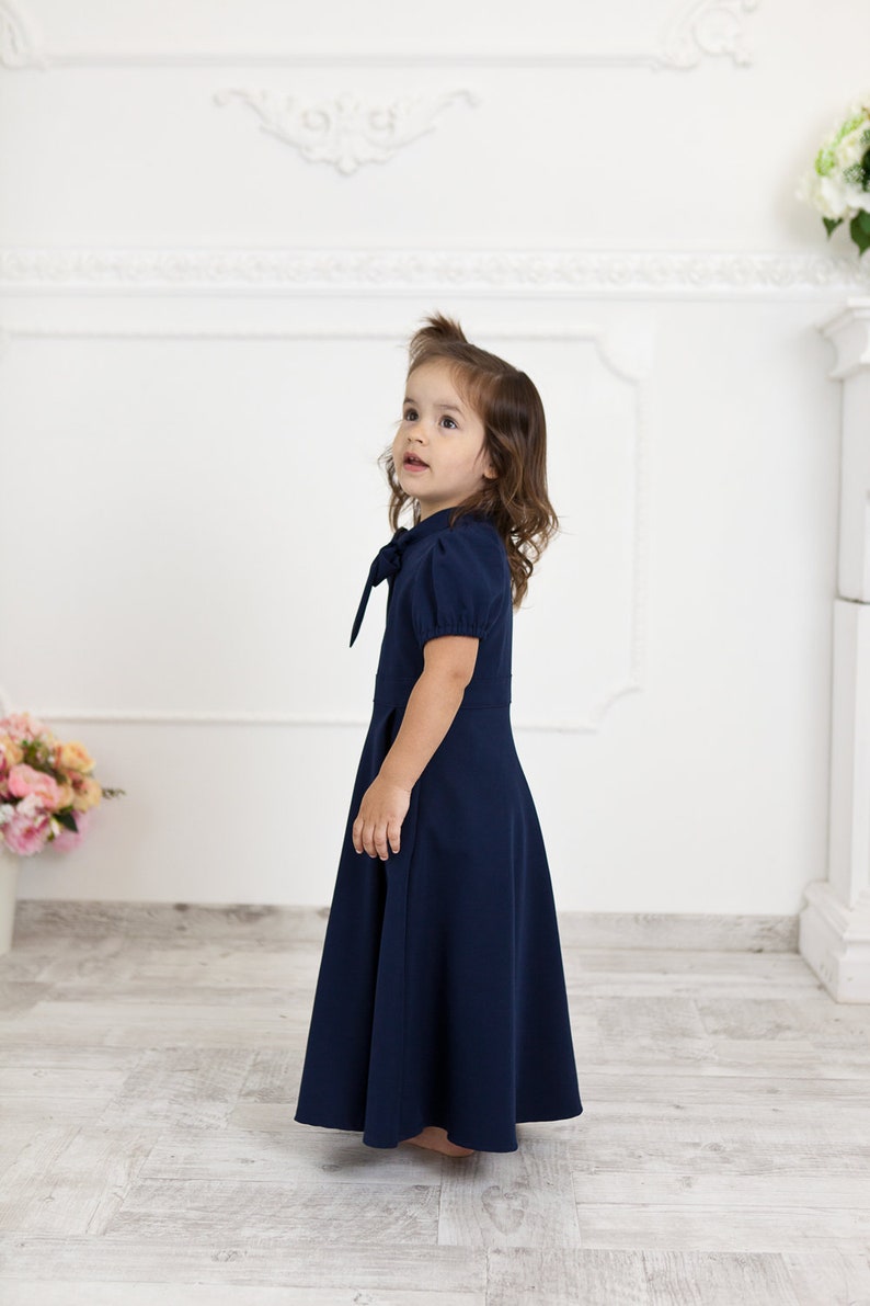 Navy blue mother daughter matching dresses. Chic mommy and me outfits with bow and pockets. Family look formal clothing image 3
