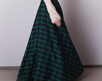 Flared black and green plaid skirt with pockets. Long green tartan skirt with sash. Classic outfit women