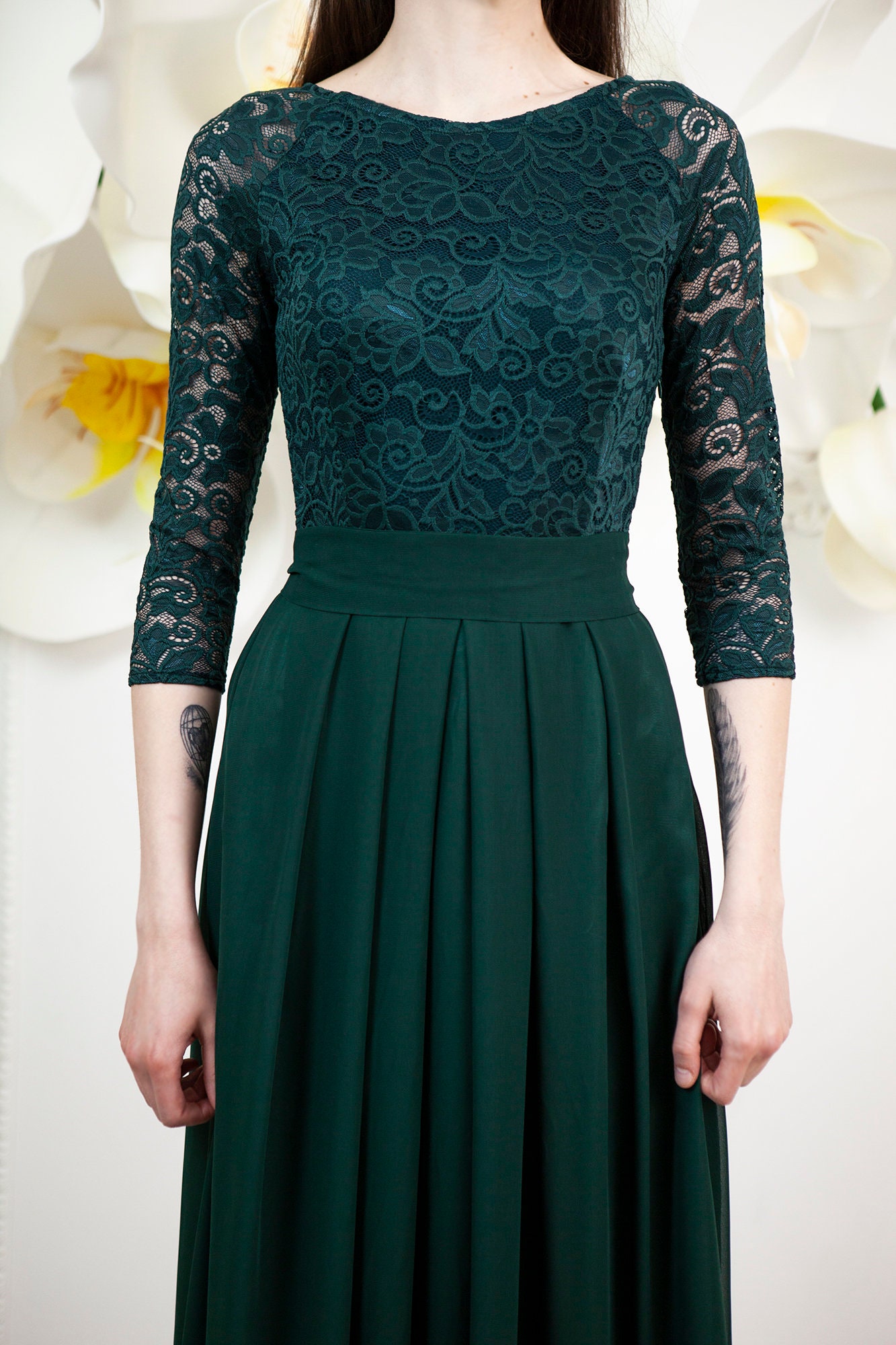 green lace gown with sleeves