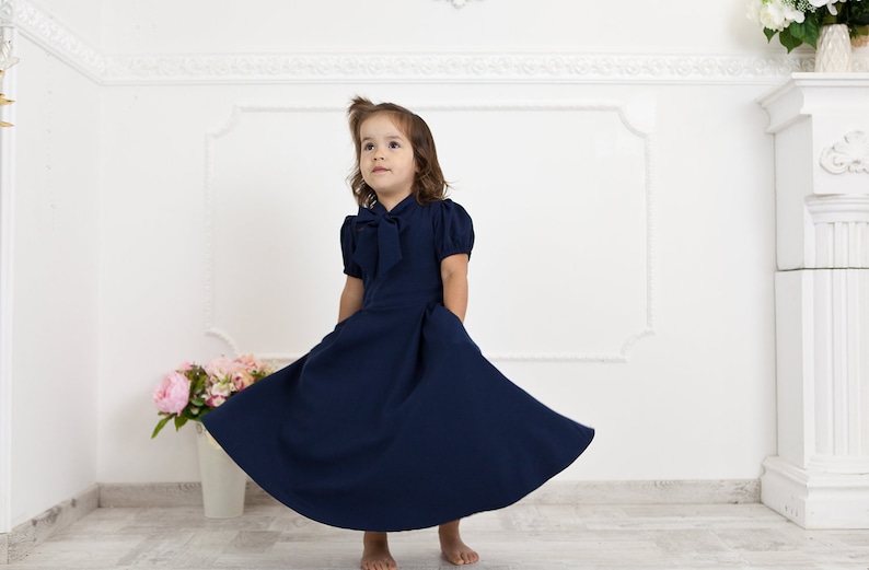 Navy blue mother daughter matching dresses. Chic mommy and me outfits with bow and pockets. Family look formal clothing image 2