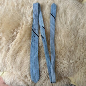 Vintage blue thin necktie by “McKnight”