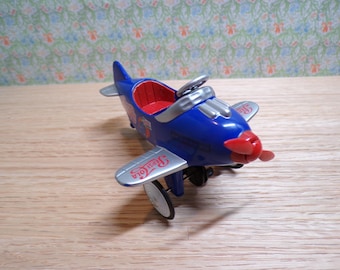 Dollhouse miniature pepsi plane by heidi ott