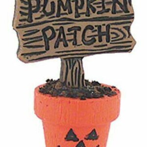 Miniature halloween flower pot with pumpkin patch sign