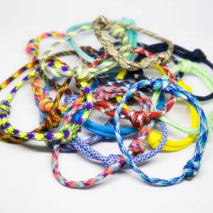 BOLSA DE AGARRE - Pulseras ajustables - Paracord