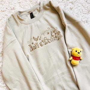 Embroidered Winnie the Pooh Sweatshirt: Pooh Parade Design