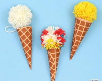 May include: Three colorful pom-pom ice cream cones on a light blue background. The cones are made of brown paper with a waffle pattern. The pom-poms are white, yellow, red, and blue. The image has the text "SUPER FUN PRINTABLES".