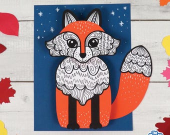 May include: A paper craft fox with orange and black coloring, featuring intricate black and white line art patterns on its face and chest. The fox is positioned on a dark blue rectangular background with white star accents and the text The Craft Train.