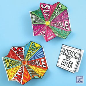 May include: Two printable Mother's Day cards. One card is a pop-up card with a colorful starburst design and the words "SUPER, EXCELLENT, INCREDIBLE, WONDERFUL, AMAZING, FANTASTIC". The other card is a simple card with the words "MOM you ARE".