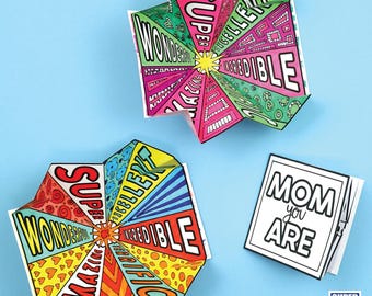 May include: Two printable Mother's Day cards. One card is a pop-up card with a colorful starburst design and the words "SUPER, EXCELLENT, INCREDIBLE, WONDERFUL, AMAZING, FANTASTIC". The other card is a simple card with the words "MOM you ARE".