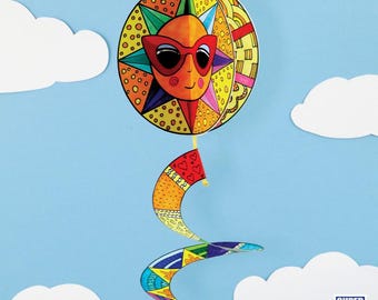 May include: A colorful, whimsical sun mobile with a smiling face wearing red sunglasses. The sun is suspended by a yellow string, with a spiral tail below. The background is a blue sky with white clouds. The text "SUPER FUN PRINTABLES" is in the bottom right corner.