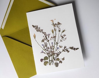 Handmade different Blank Greeting cards with real pressed flowers, set of 4. Comes with four green envelopes. Size 7X5 inches.