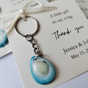 Gastbedankjes voor bruiloft met schelpensleutelhangers. Gastcadeau voor vrijgezellenfeest, babyshower. Bulk huwelijksbedankjes. Gepersonaliseerd bedankje.