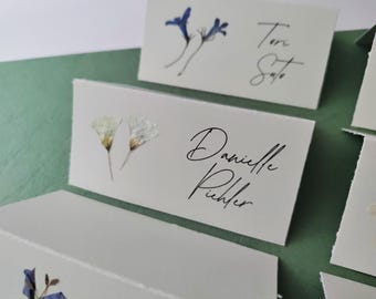 Personalized, handmade Wedding Place Cards with real pressed flowers.